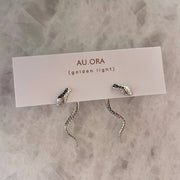 Serpentine Earrings: Silver
