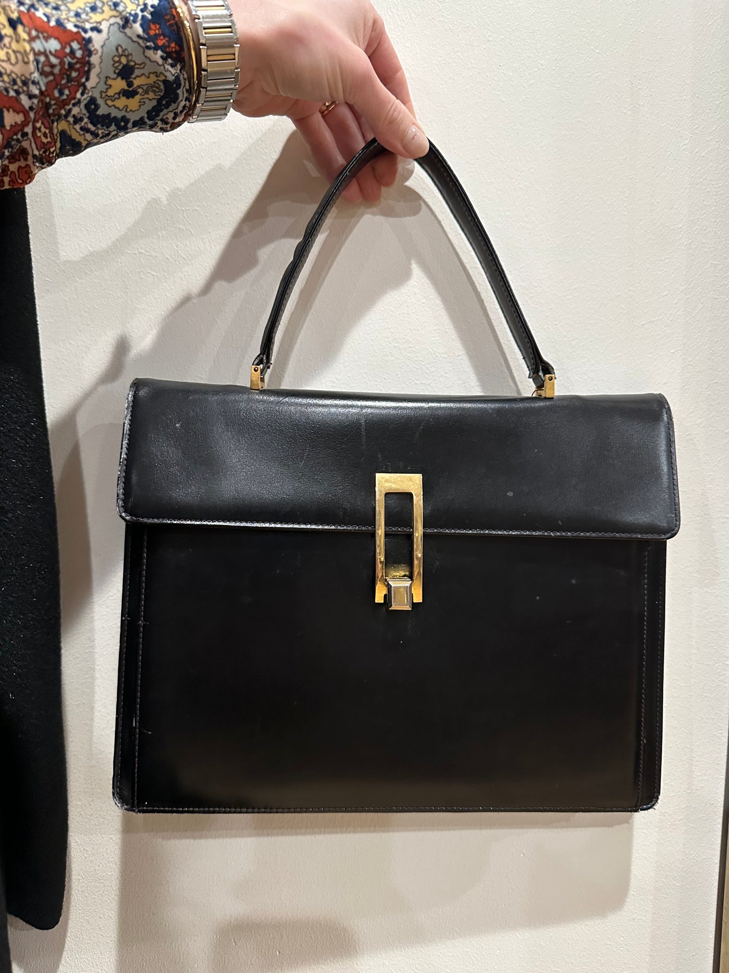 Black with gold hardware handbag