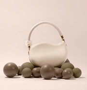 Jennie Recycled Vegan Crossbody Bag in Ivory