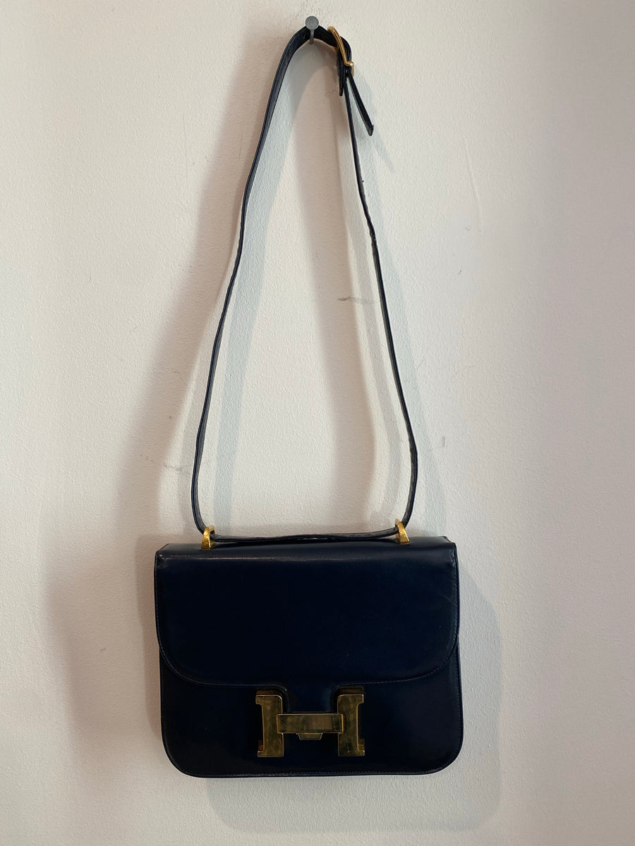 Navy Blue Handbag with Gold "H" Enclosure