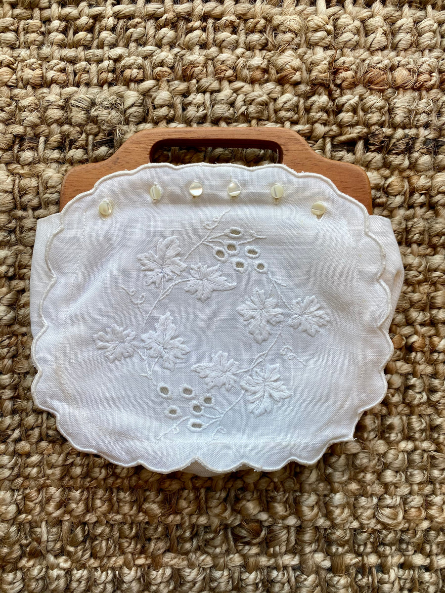 White Eyelet Clutch