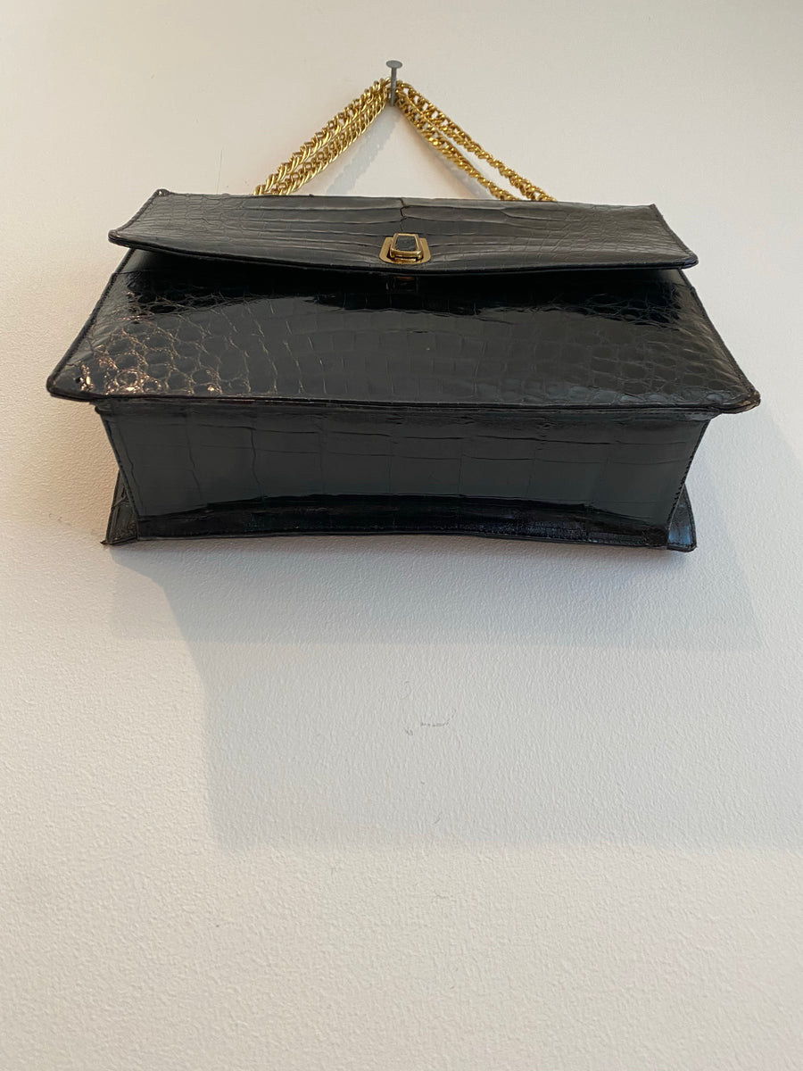 Black faux skin purse with chain handle