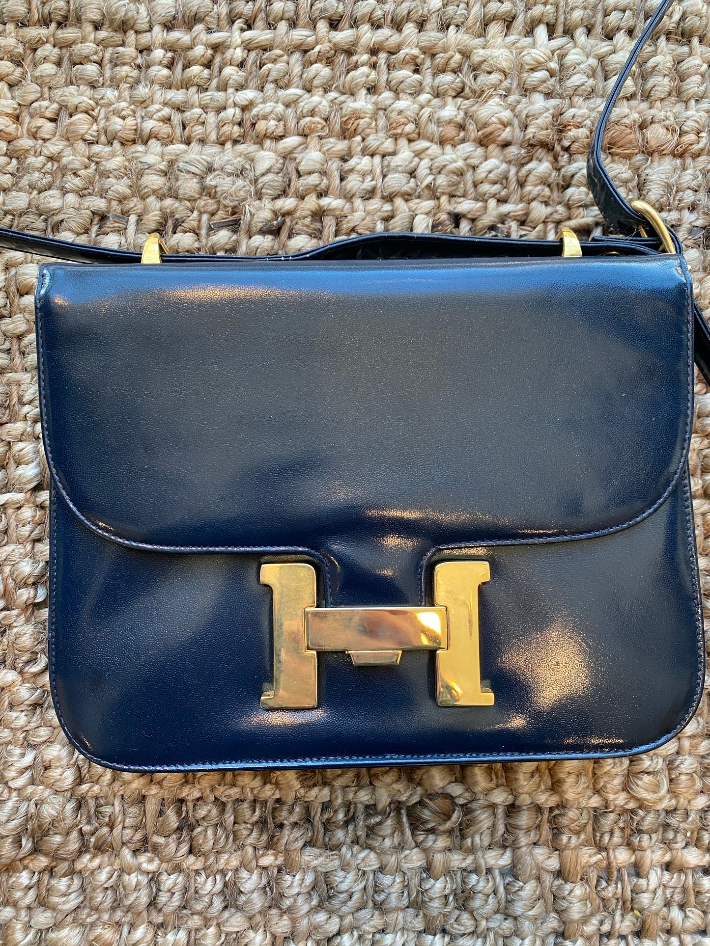Navy Blue Handbag with Gold "H" Enclosure