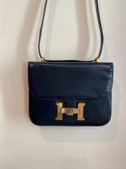 Navy Blue Handbag with Gold "H" Enclosure