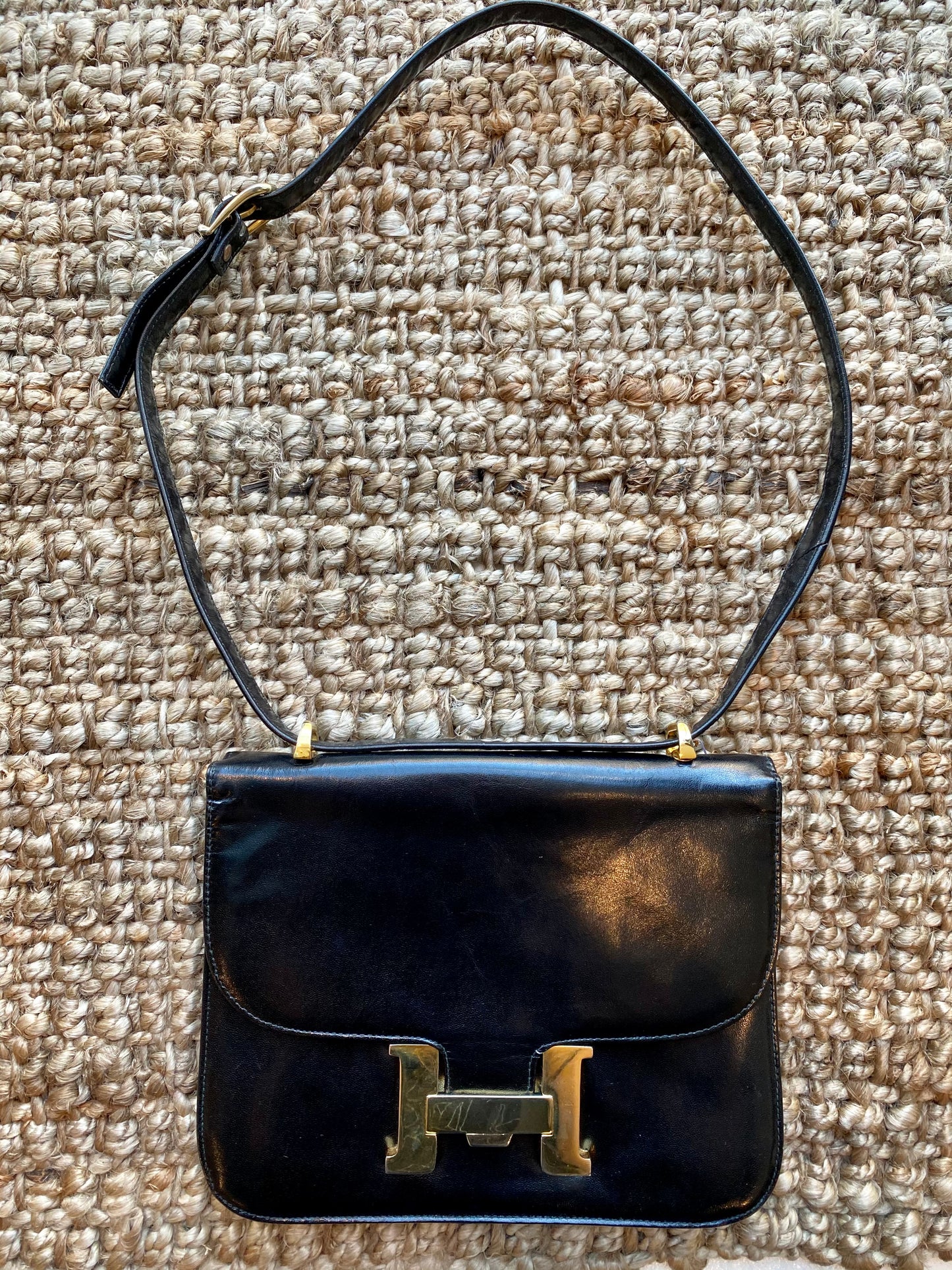Black Handbag with Gold "H" Enclosure