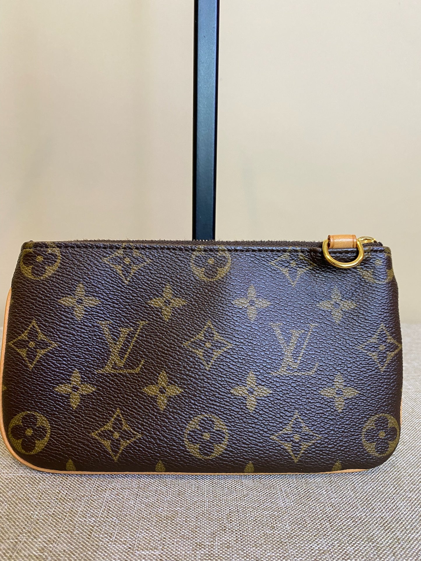 Louis Vuitton Pochette Tikal pouch, 32