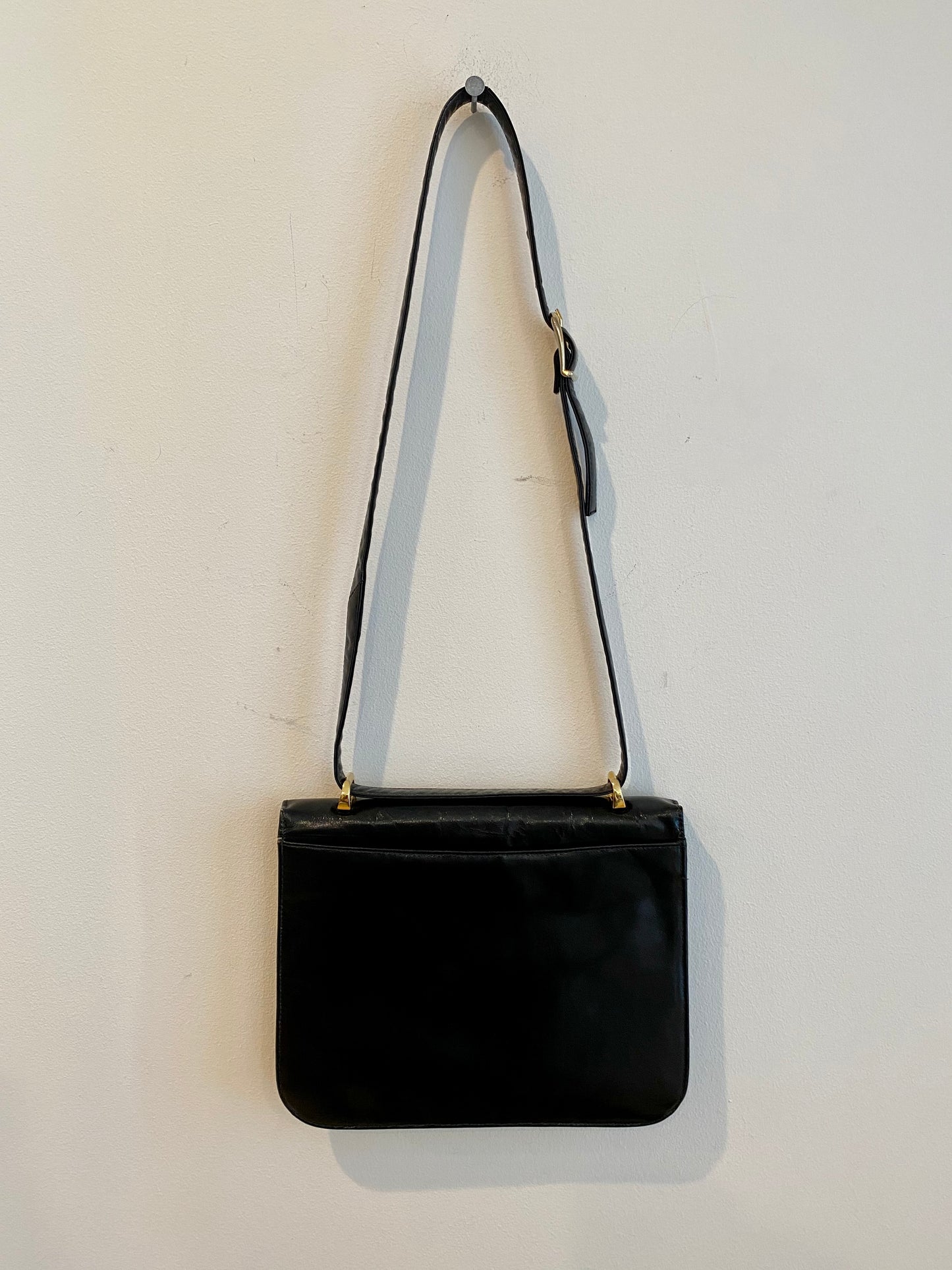 Black Handbag with Gold "H" Enclosure