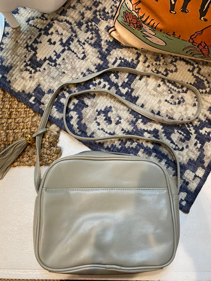 Grey handbag with woven flap