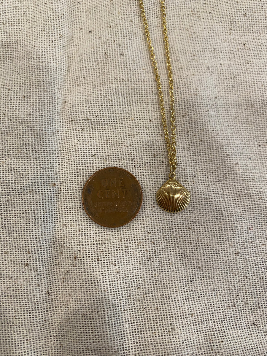 Tiny gold shell necklace