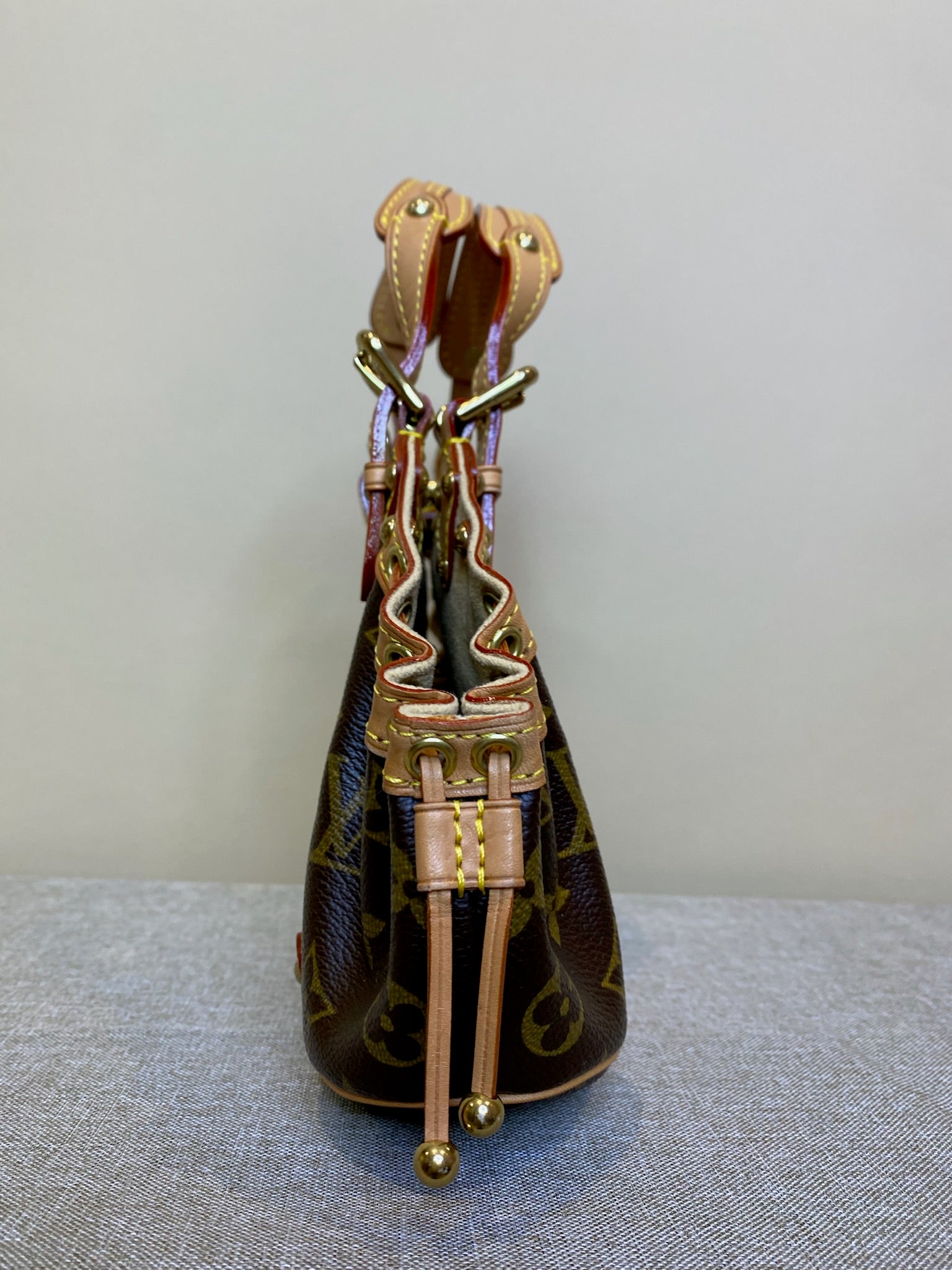 LOUIS VUITTON Monogram Beaubourg gold buckle handle bag brown