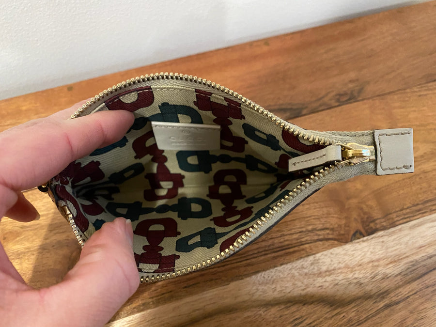 Gucci, Off White Monogram Guccissima wallet, 34